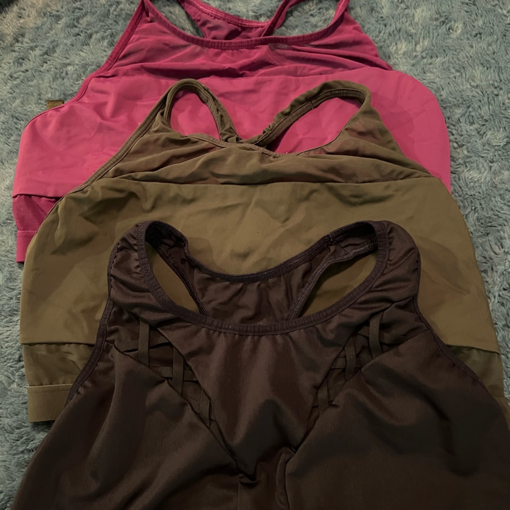 Trio of Victoria Secret sports Bras. / LG. Like new. Worn once .